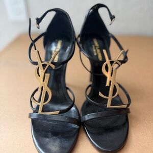 Yves Saint Laurent Black Heels with Gold Logo Accent